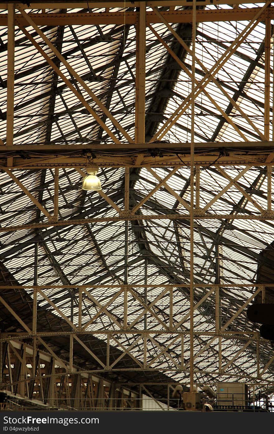 Interior of industrial glass roof and associated framework