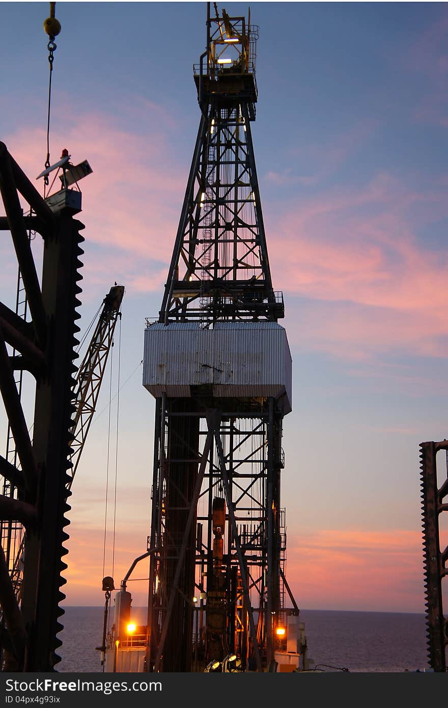 Jack Up Drilling Rig (Oil Rig) at Twilight Time - Oilfield Industry. Jack Up Drilling Rig (Oil Rig) at Twilight Time - Oilfield Industry