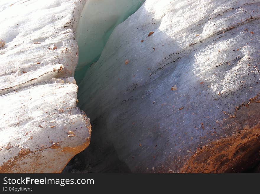 Crack in the glacier in the mountains