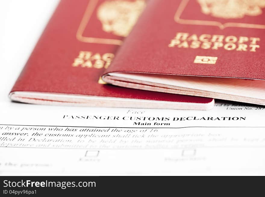 Two passports are on the passenger custom declarat