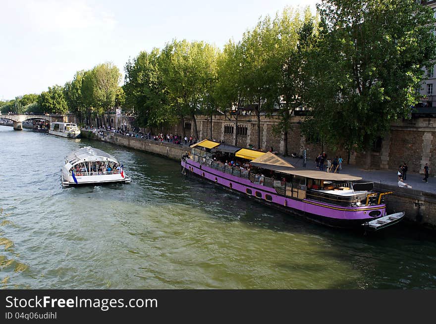 Tourist cruise boat in River Seine Paris France. Tourist cruise boat in River Seine Paris France