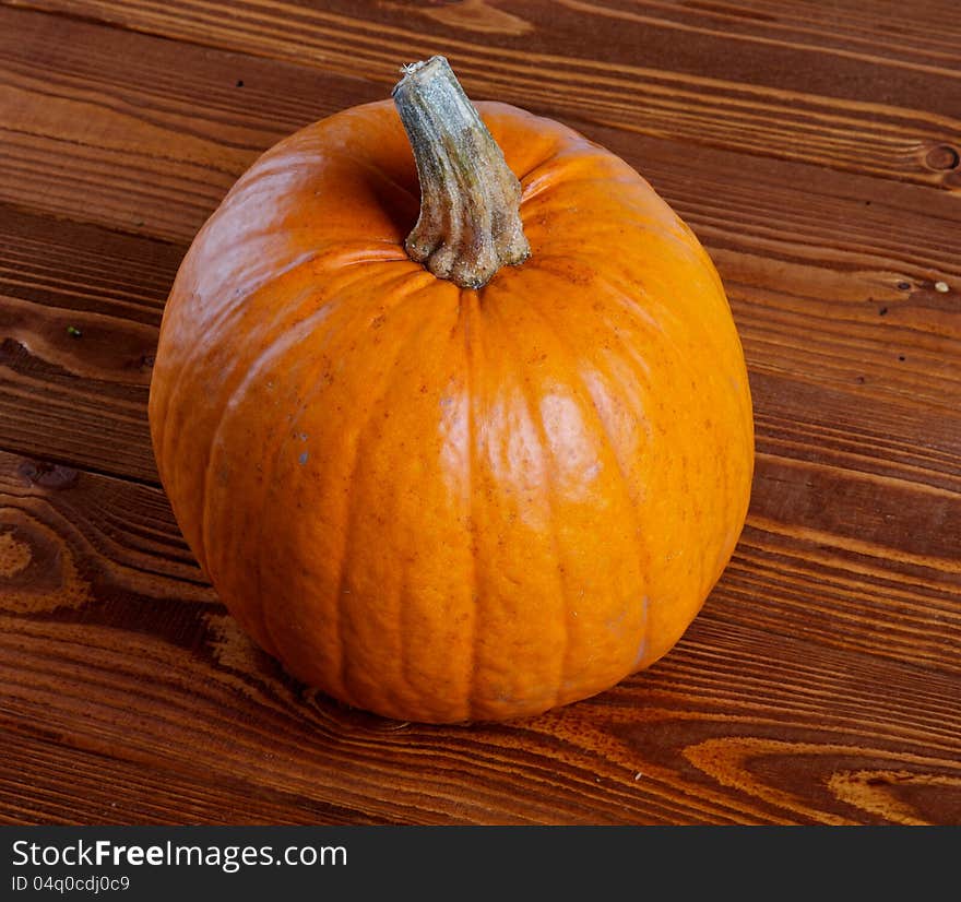 Perfect Pumpkin isolated on Wooden background