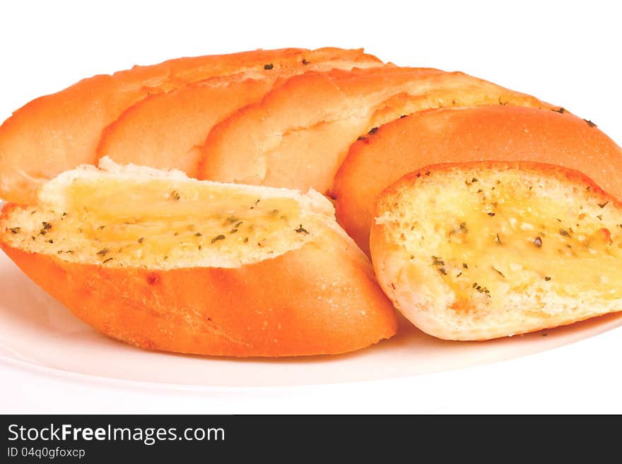 Garlic breads in white dish on white background. Garlic breads in white dish on white background