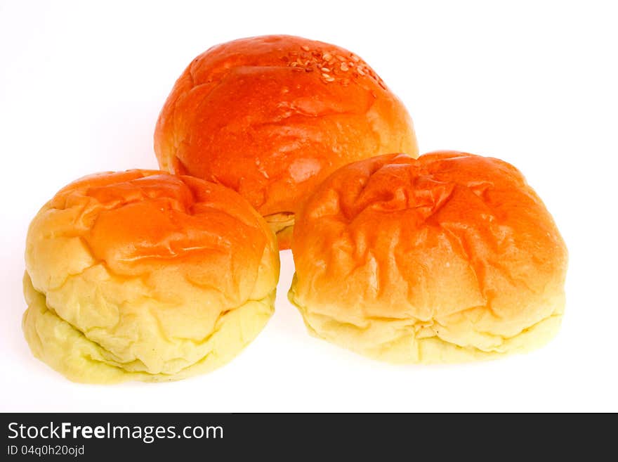 Bakery cake filled with custard cream on white background