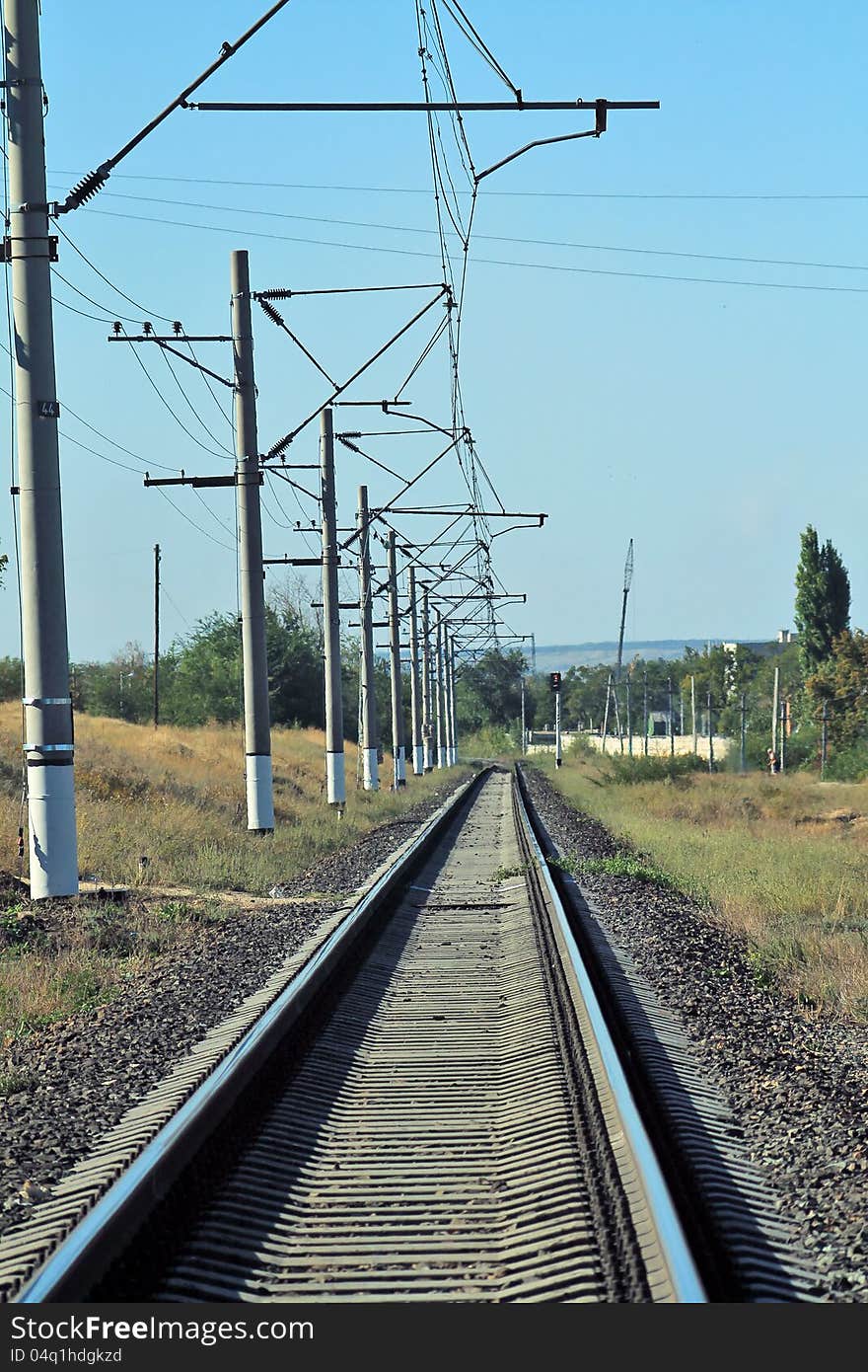 Railway in Krasnoarmeysk district of Volgograd, blue sky, fine weather