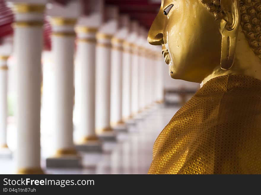 Golden buddha image in Nakornpanom Province, Thailand