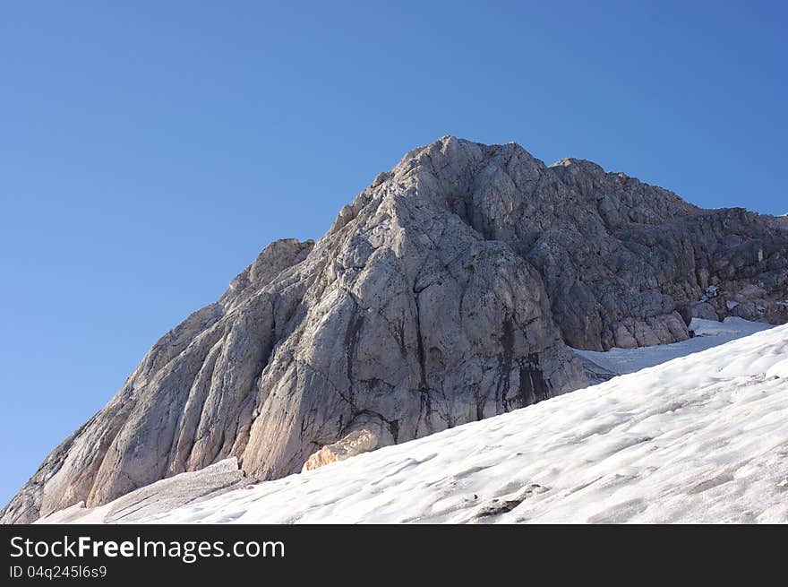 Mountain peak Fisht and glacier on his slope