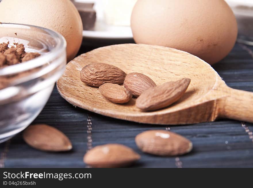 Almonds in a wooden spoon