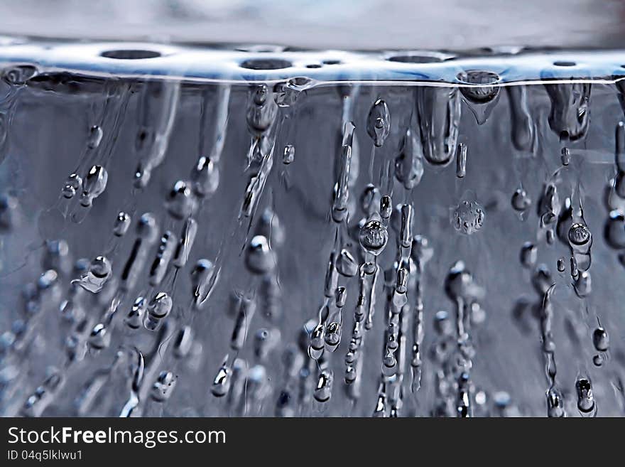 The close-up of a block of ice are enclosed in the air bubble. The close-up of a block of ice are enclosed in the air bubble