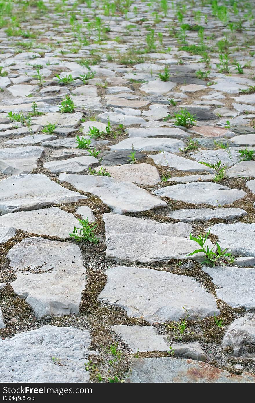 Fragment of bridge made of granite stone. Background, texture. Fragment of bridge made of granite stone. Background, texture