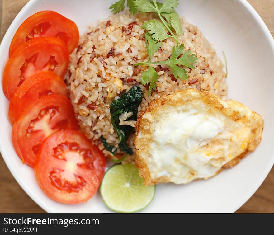 Delicious Thai fire rice with fire egg