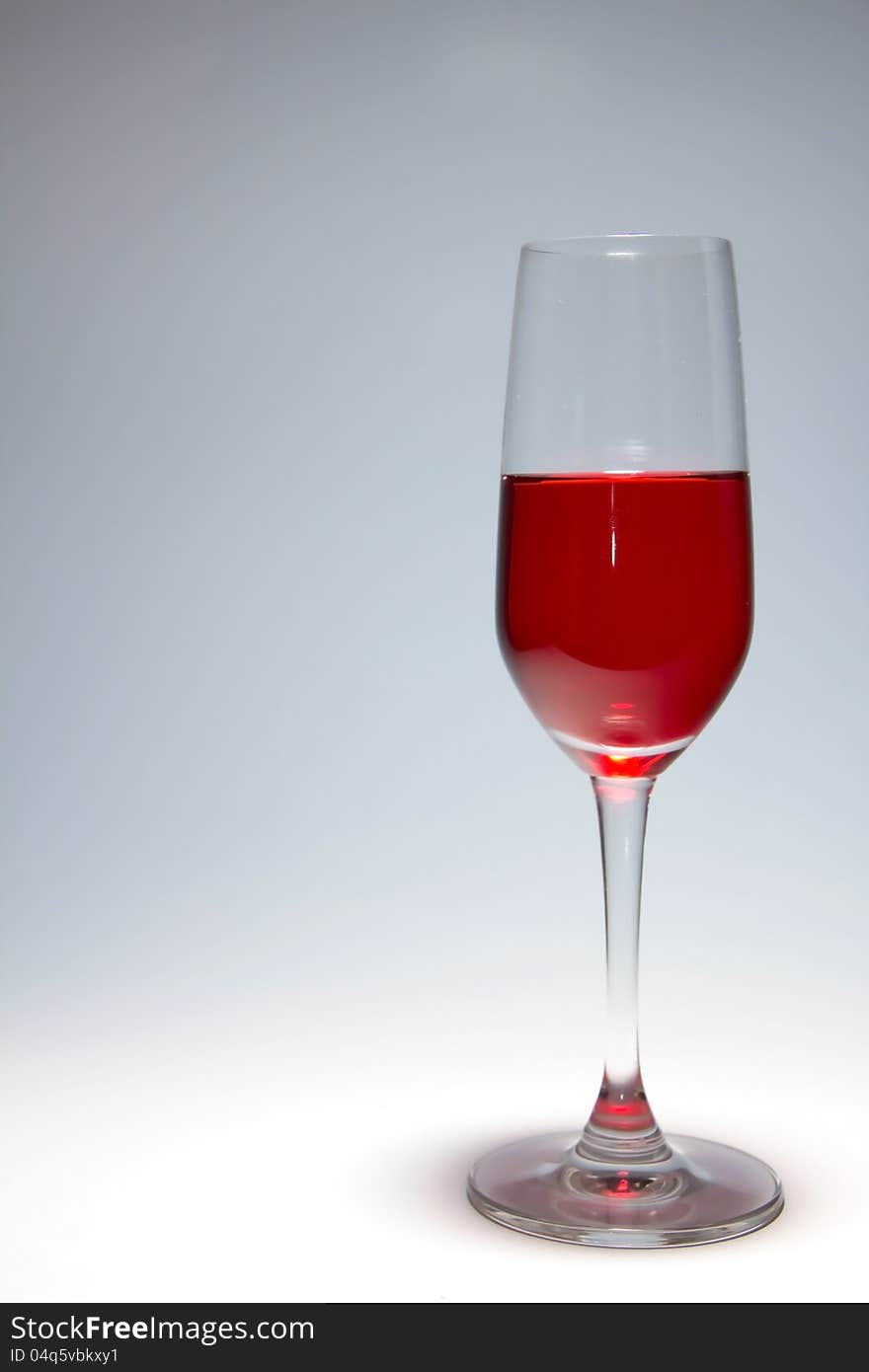 red wine glass in white background