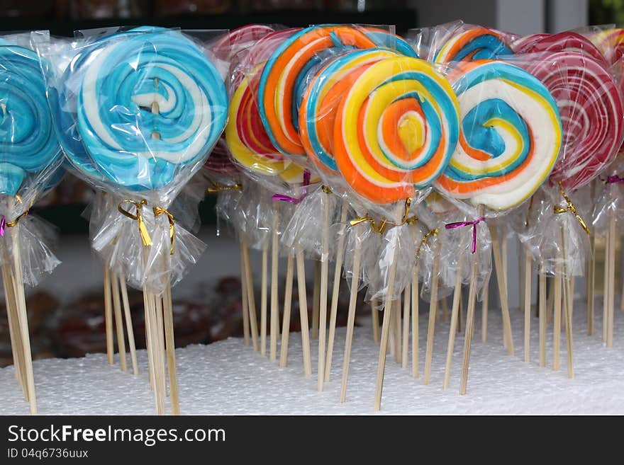 Sweet colorful lollipops exposed outdoor