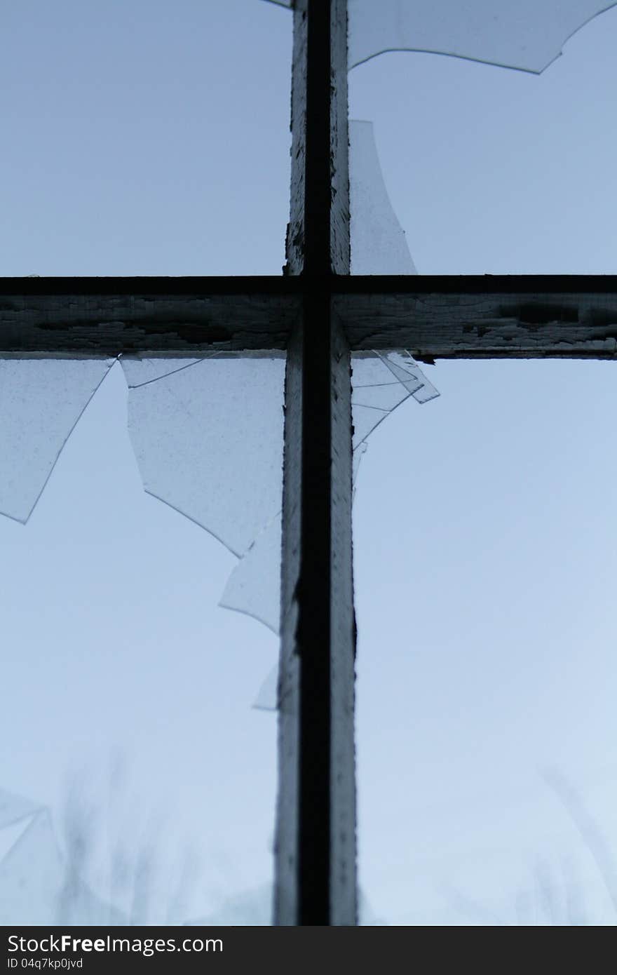 Cross And Broken Window