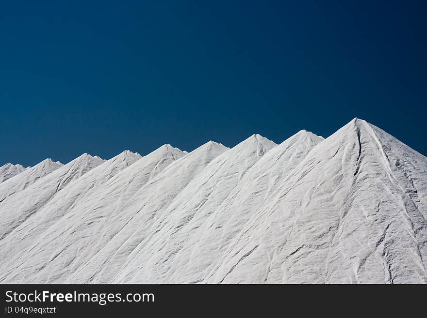 Mountains of salt at Santa Pola, Spain, obtained from the evaporation of sea water. Mountains of salt at Santa Pola, Spain, obtained from the evaporation of sea water