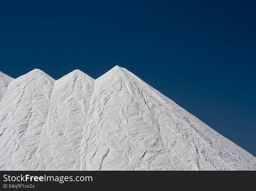 Mountains of salt at Santa Pola, Spain, obtained from the evaporation of sea water. Mountains of salt at Santa Pola, Spain, obtained from the evaporation of sea water