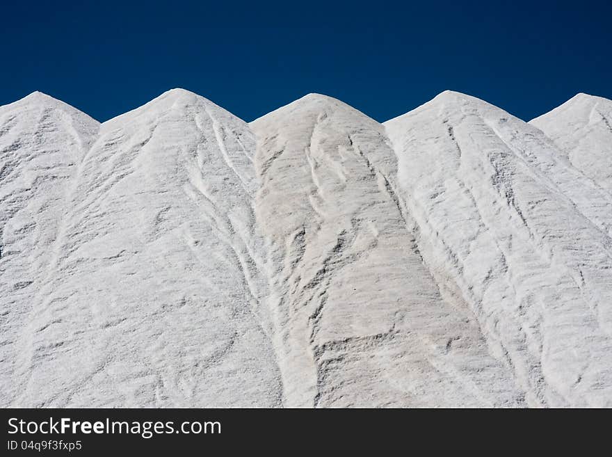 Mountains of salt at Santa Pola, Spain, obtained from the evaporation of sea water. Mountains of salt at Santa Pola, Spain, obtained from the evaporation of sea water