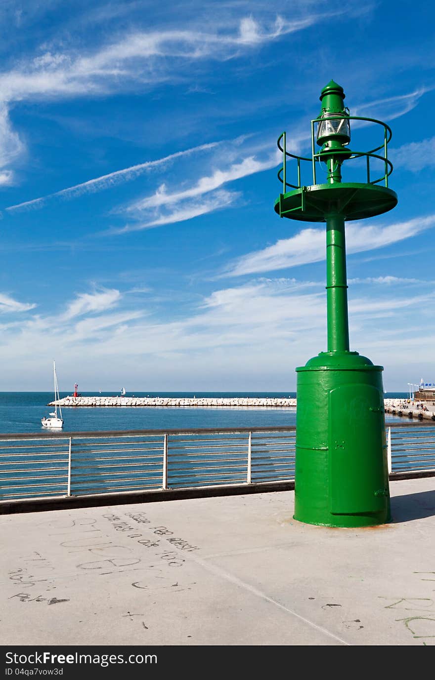 Rimini lighthouse silhouetted on the horizon