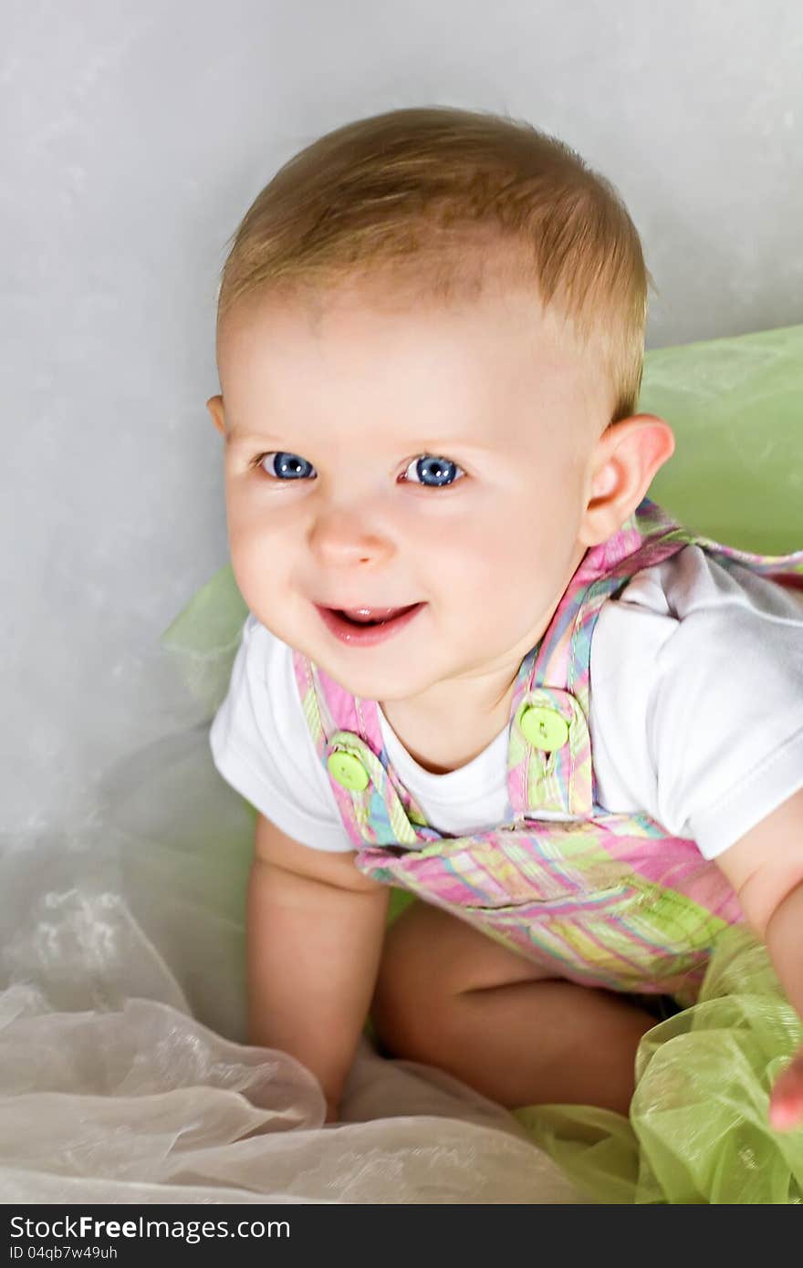 Funny baby girl crawling and smiling