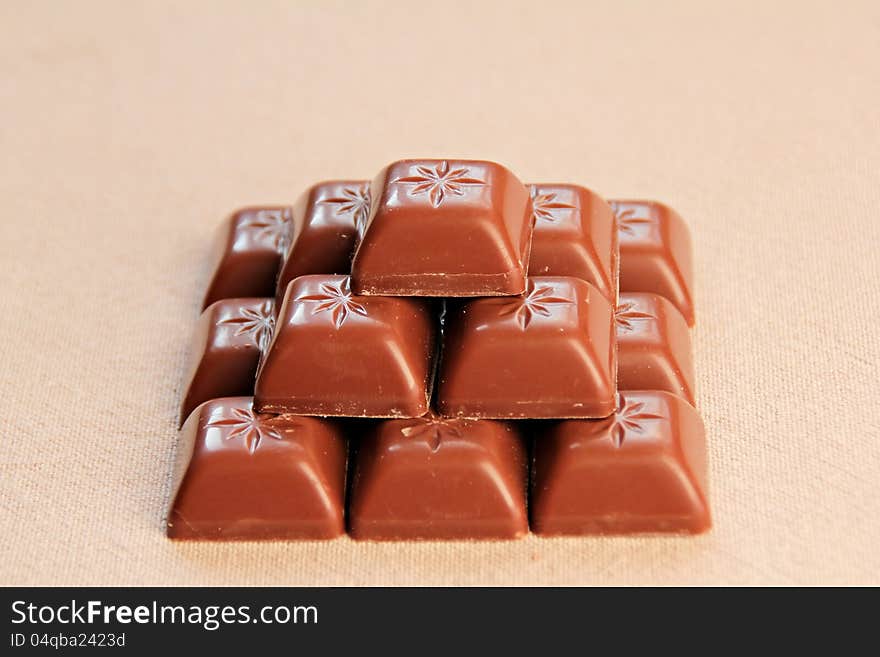 Pyramid from the pieces of milk chocolate