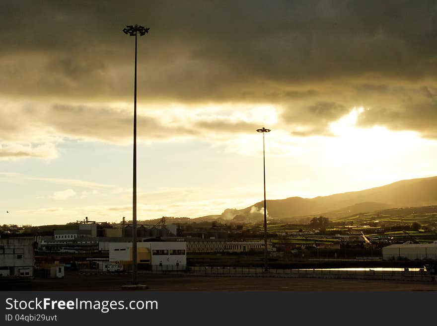 Port of Praia da Vitória at sunset in a cloudy day