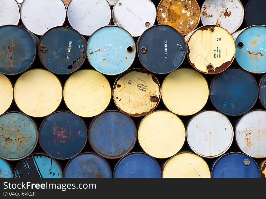 Old fuel tanks stacked background