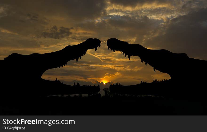 Silhouette Two Crocodiles In The Morning.