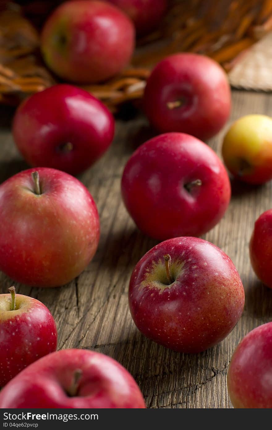 Ripe apples on a rustic kitchen table