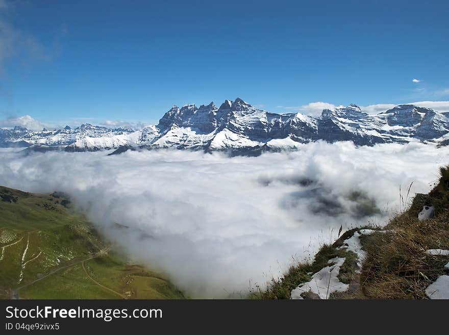 Morning fog in Swiss Alps