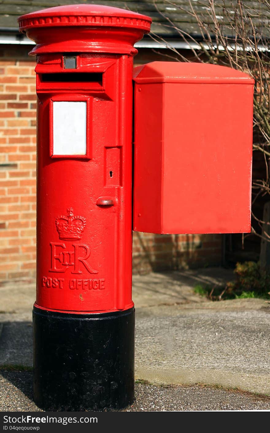 Image of a red british post box in London. Image of a red british post box in London
