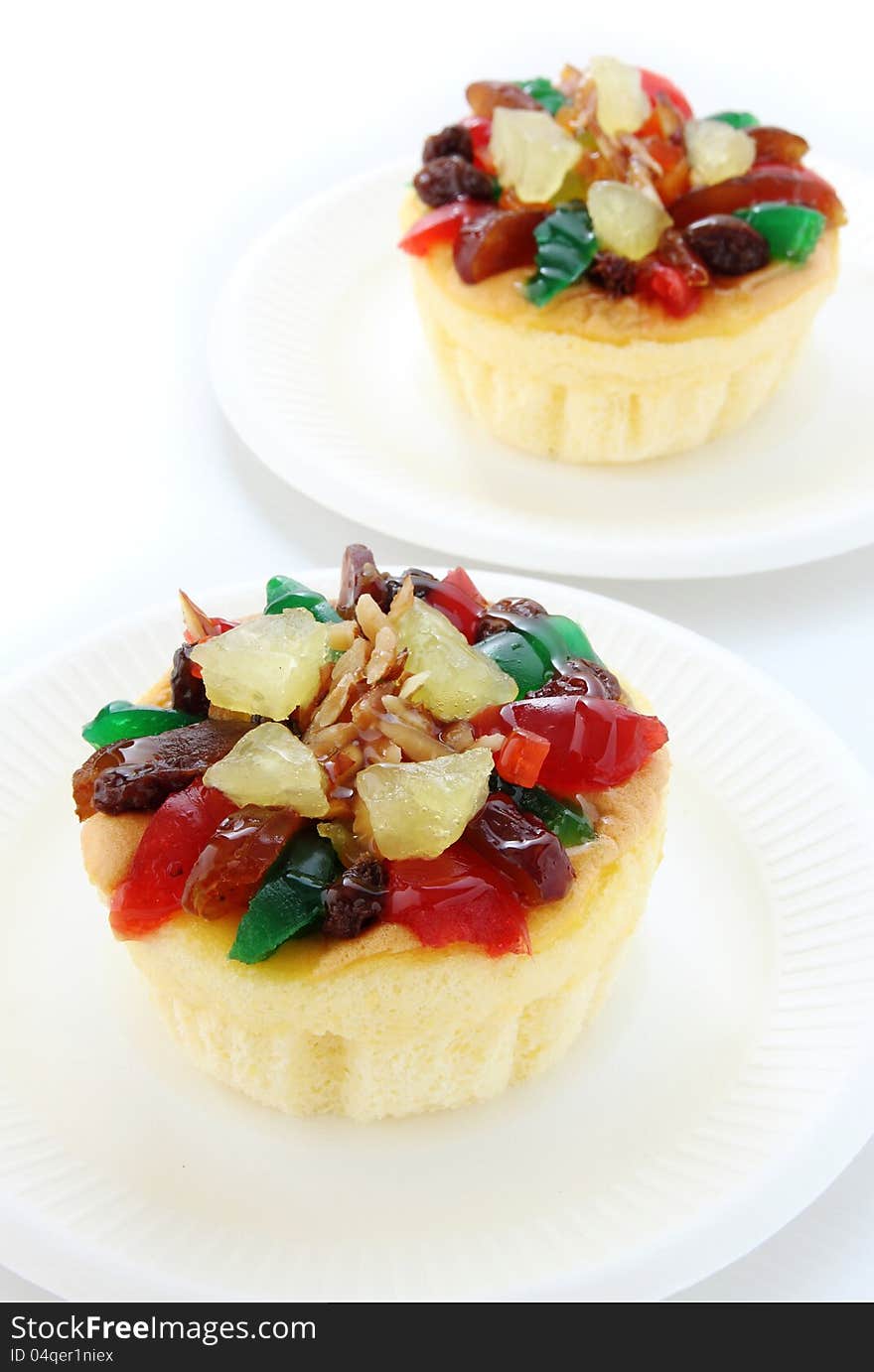 Fruit cake on white plate