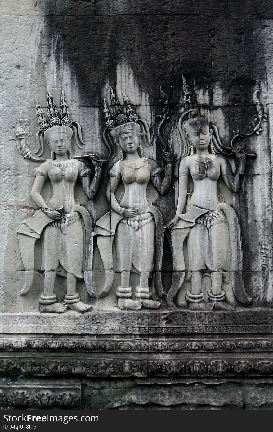 Bas-relief at Angkor Wat temple in Cambodia.