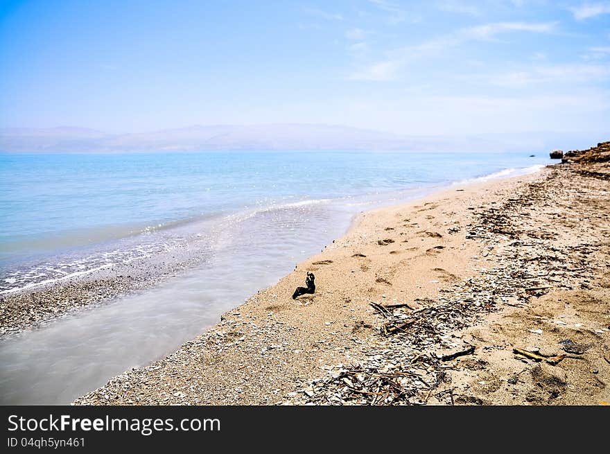 View on the empty beach of the Dead Sea. View on the empty beach of the Dead Sea