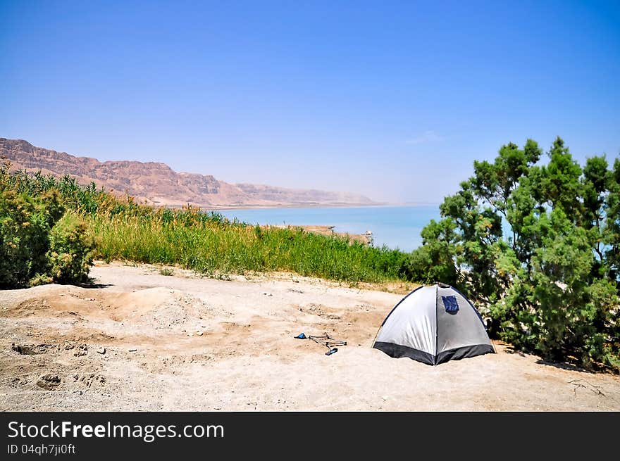 Tourist tent in oasis on the coast of the Dead Sea. Tourist tent in oasis on the coast of the Dead Sea