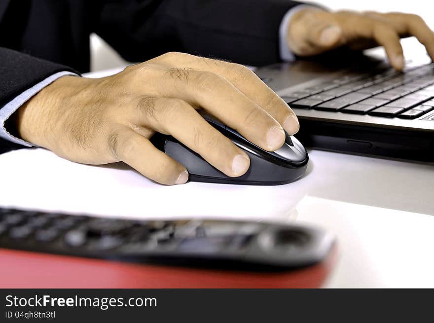 Man typing on laptop isolated over white background