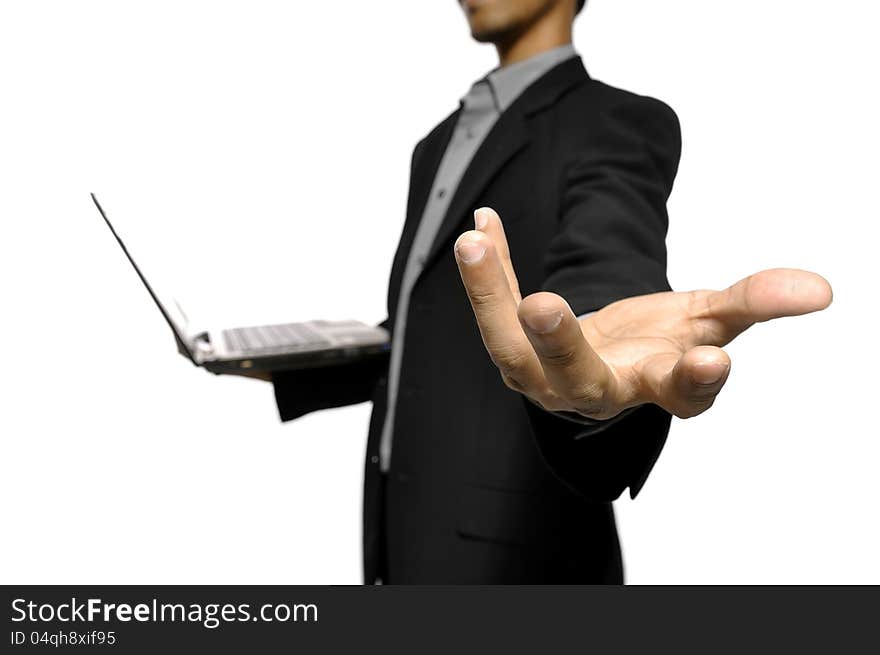 Business man give the hand for help using laptop isolated over white background