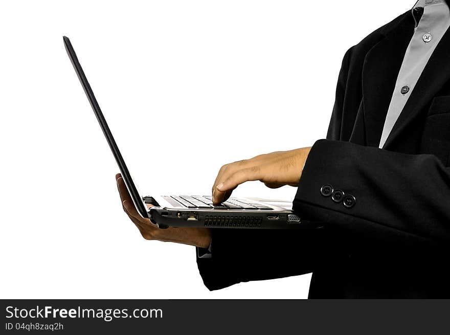 Man holding laptop and typing with hand isolated over white background. Man holding laptop and typing with hand isolated over white background