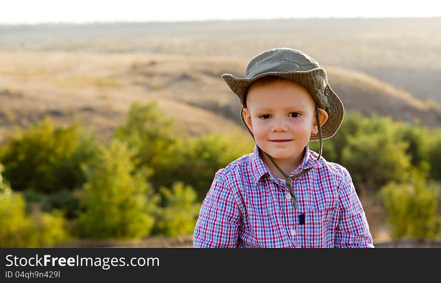 Young boy in open countryside