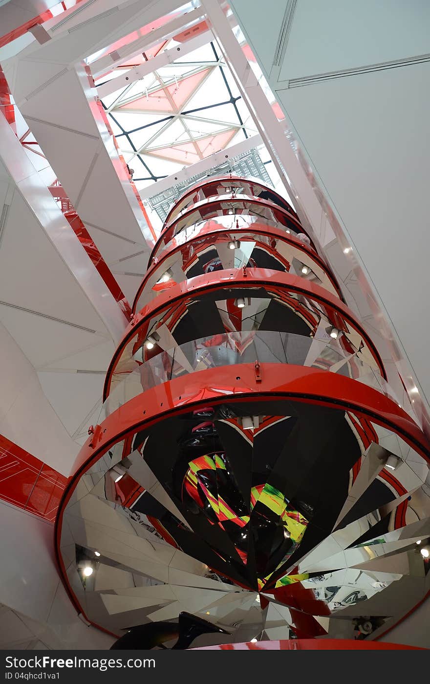 Building specially constructed for cars exhibitions in Paris. Every red circle is a floor with an exhibited car. Building specially constructed for cars exhibitions in Paris. Every red circle is a floor with an exhibited car.