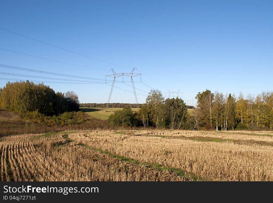 Country landscape with high-voltage line