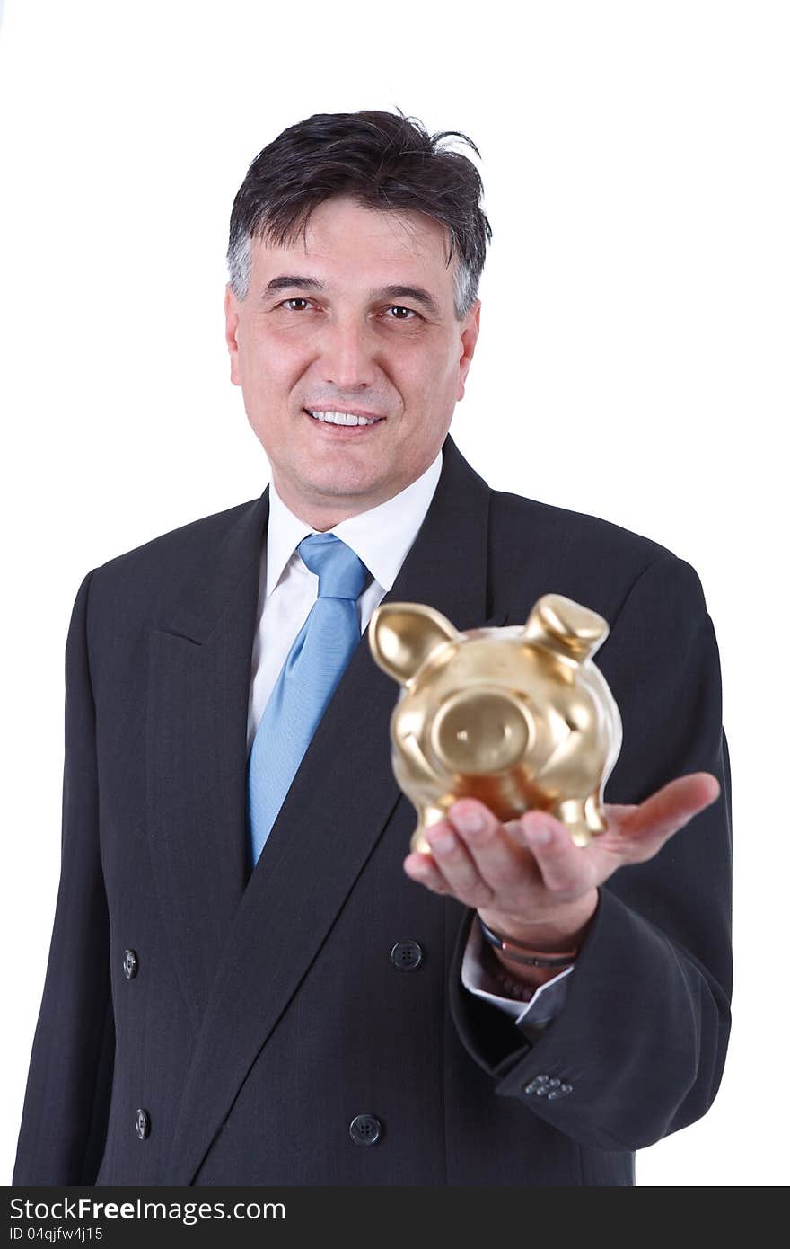 Businessman holding a piggy bank