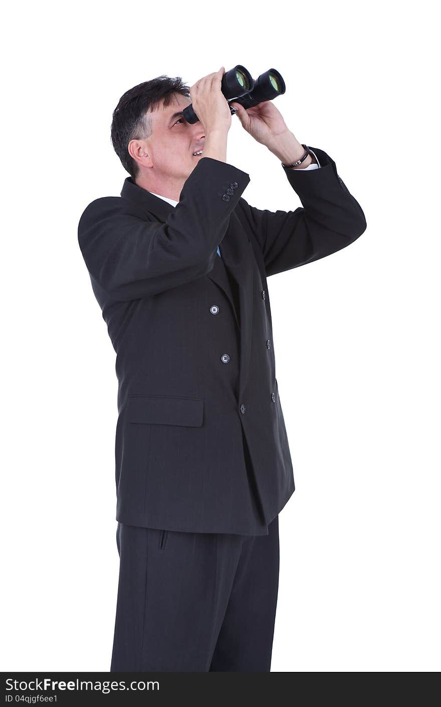 Senior businessman looking through binoculars, isolated over white background