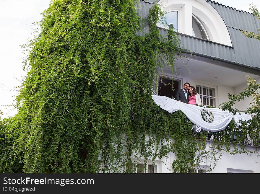 Young couple on balcony