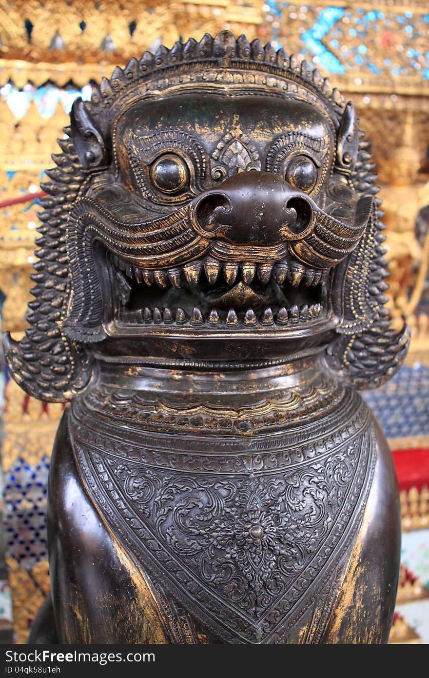 Lion bronze statue in Wat Phra Kaew,Thailand