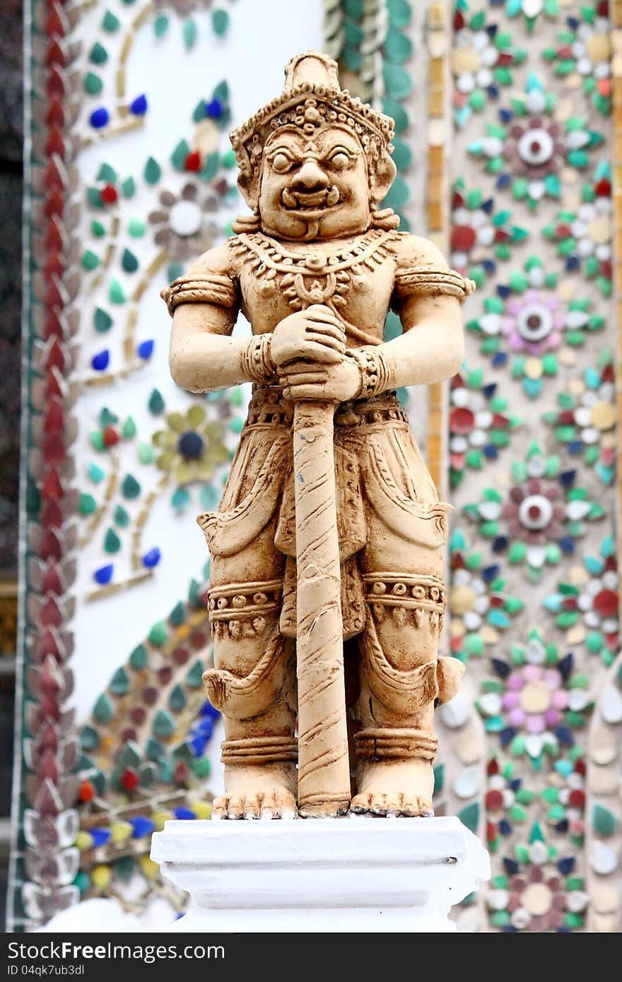 The protection giant stand in front of the gate in temple ,Thailand. The protection giant stand in front of the gate in temple ,Thailand