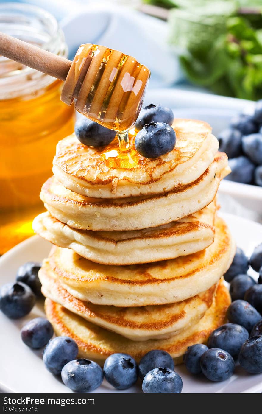 Pancakes With Pouring Honey