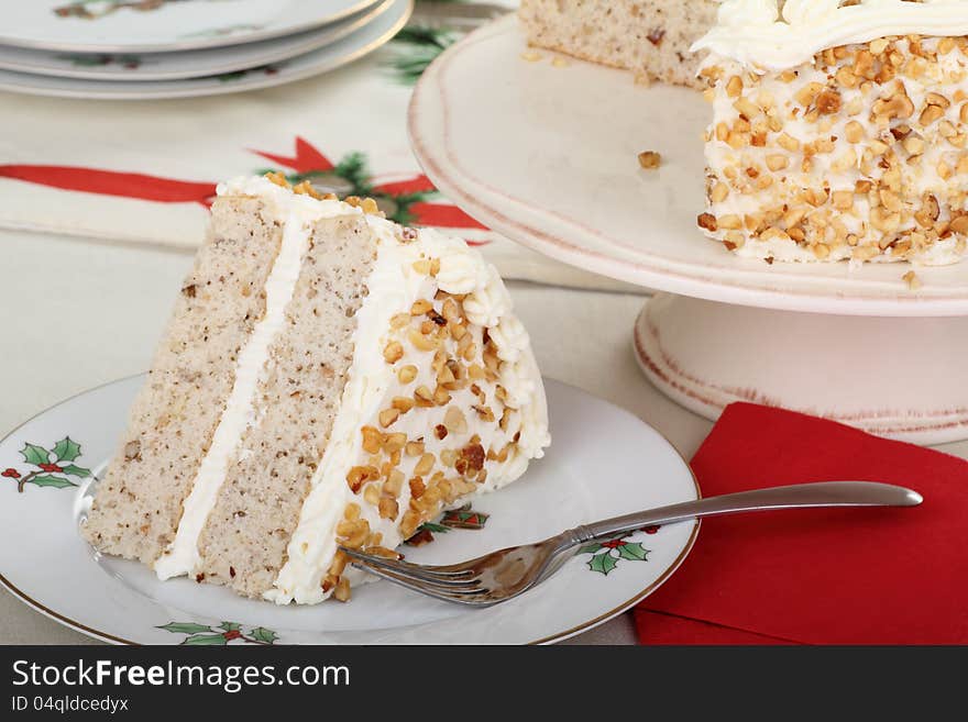 Slice of layer cake on a christmas plate