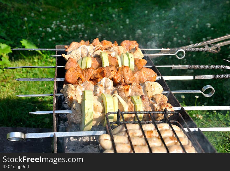 Tasty grill kebab on a charcoal with onion