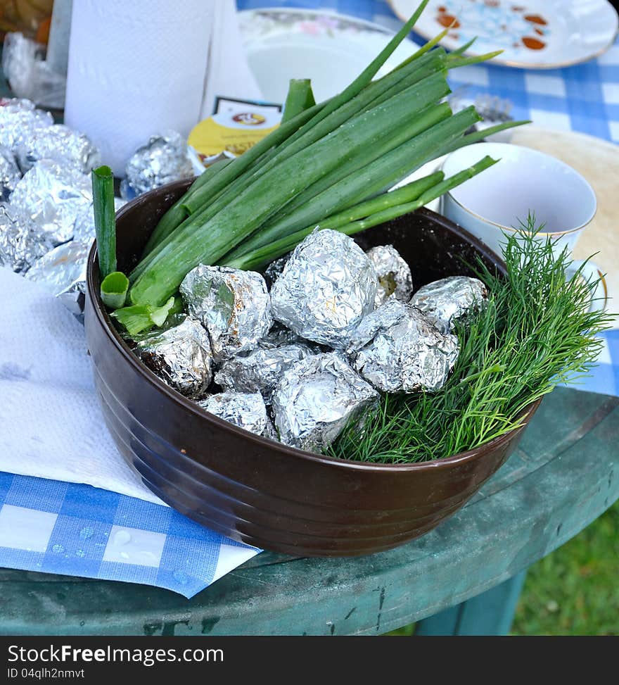 Green Onion And Potato In A Foil