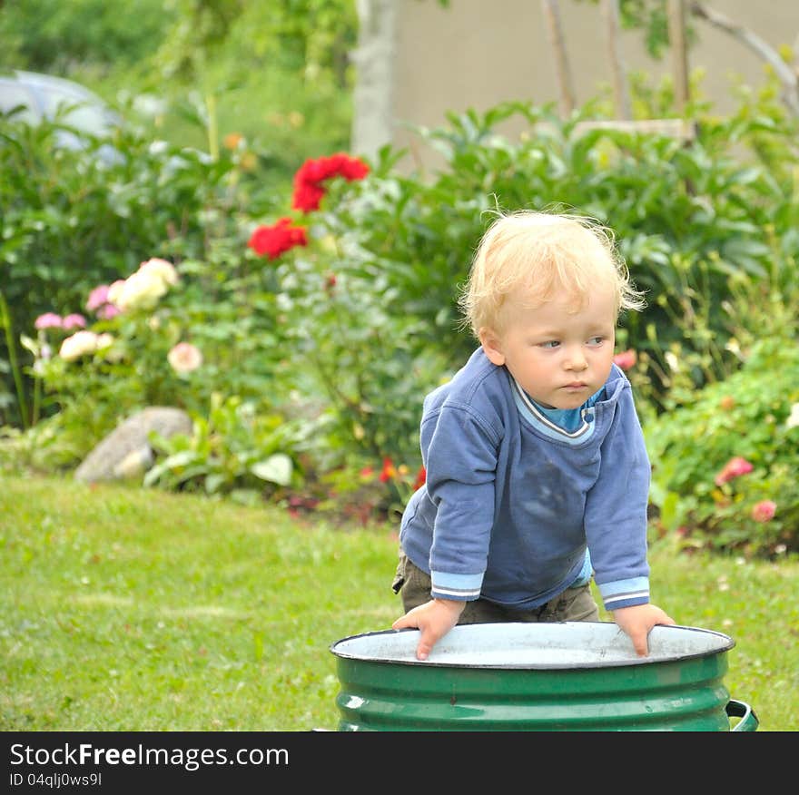 Little Baby Boy Gardener Playing